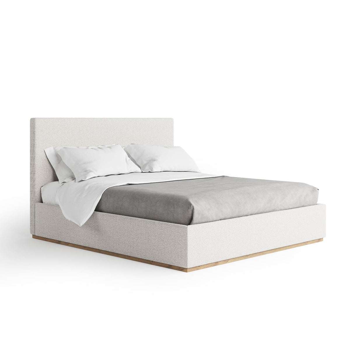 Modern bed with light gray bedding and white pillows on a white background