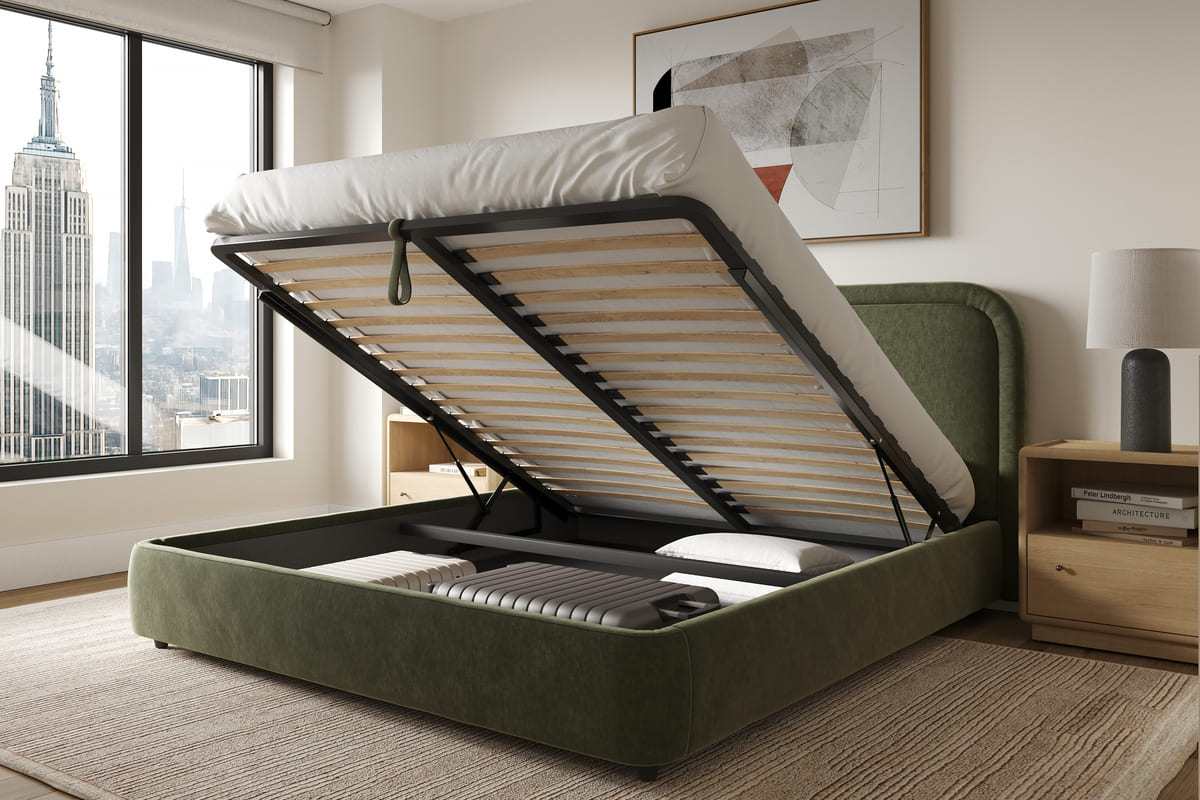 Green bed frame with open storage compartment in a room with large windows and cityscape view.