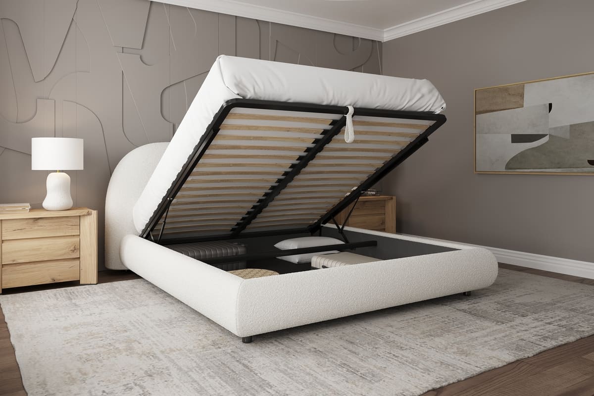 Modern white bed with storage compartments in a bedroom setting.