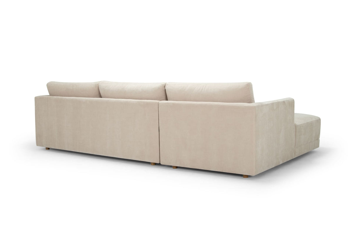 Beige sectional sofa on a white background