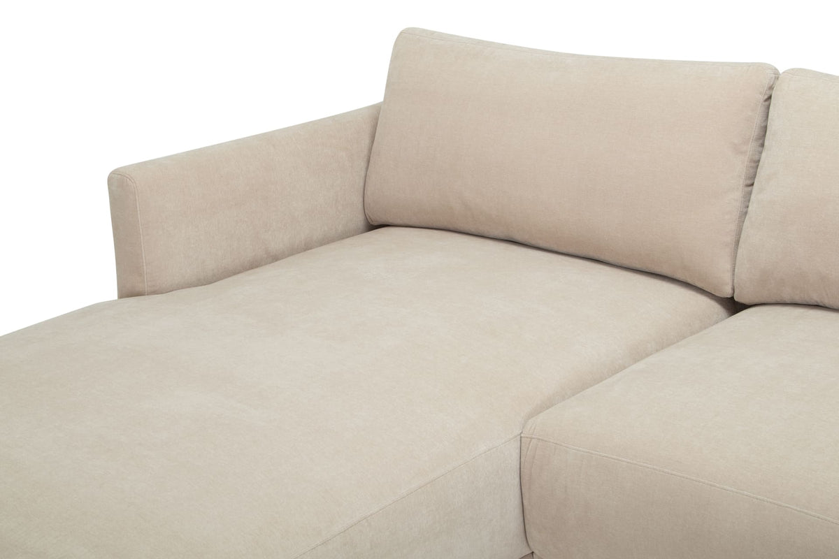 Beige sectional sofa on a white background