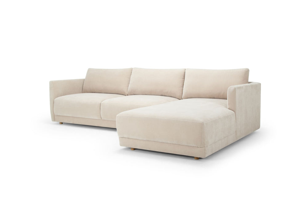 Beige sectional sofa on a white background