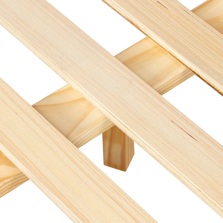 Close-up of a wooden lattice structure on a white background