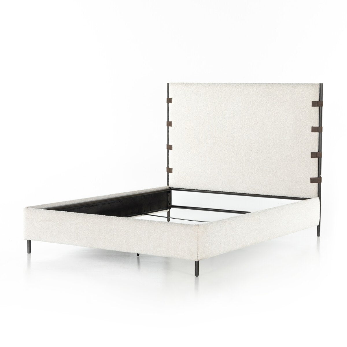 White bed frame with black metal accents on a white background