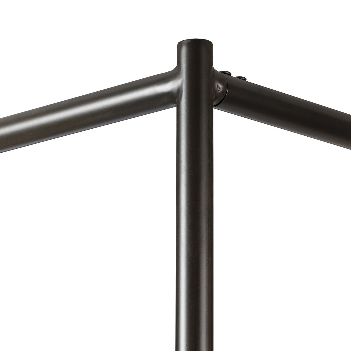 Close-up of a black metal railing on a white background