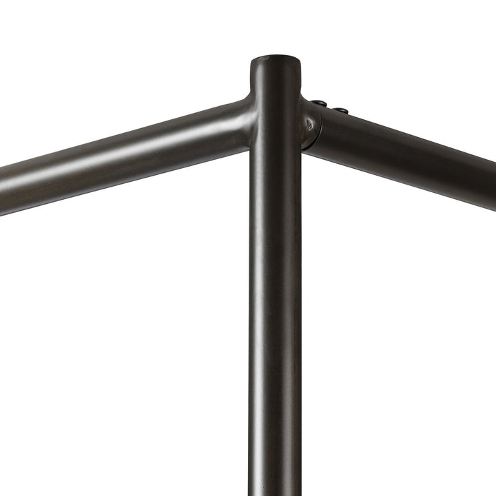 Close-up of a black metal railing on a white background