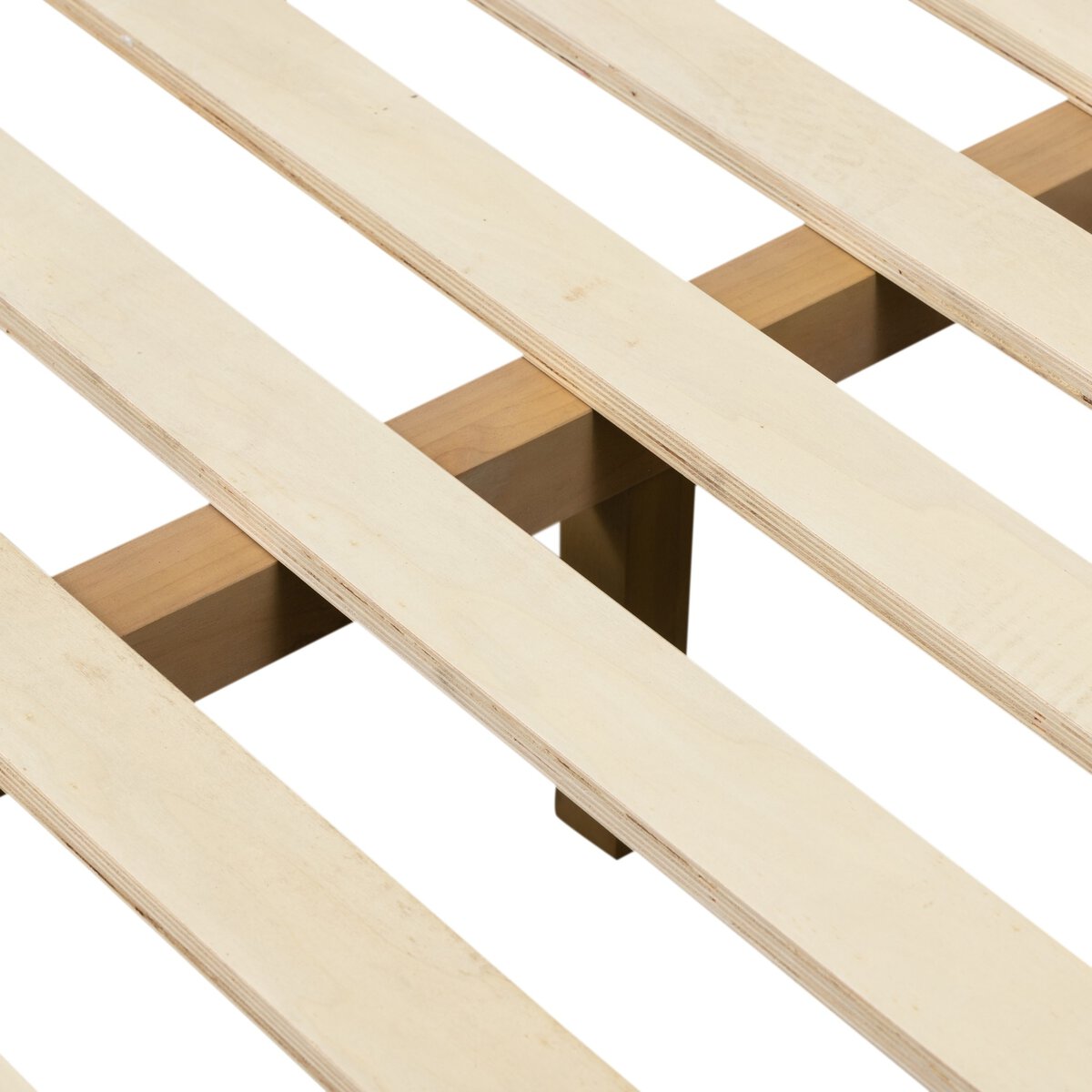 Close-up of a wooden slatted bed frame on a white background