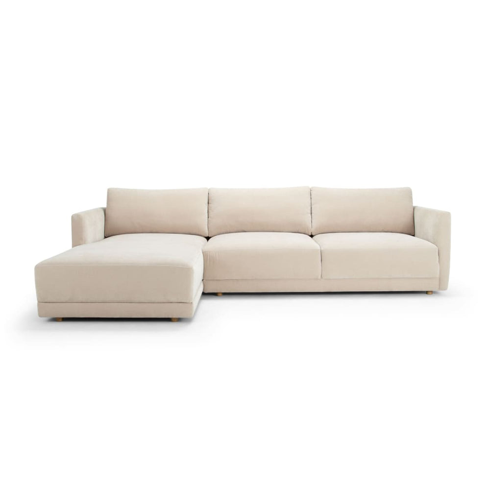 Beige sectional sofa on a white background