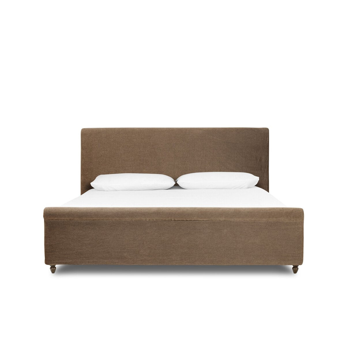 Brown upholstered bed with white bedding on a white background