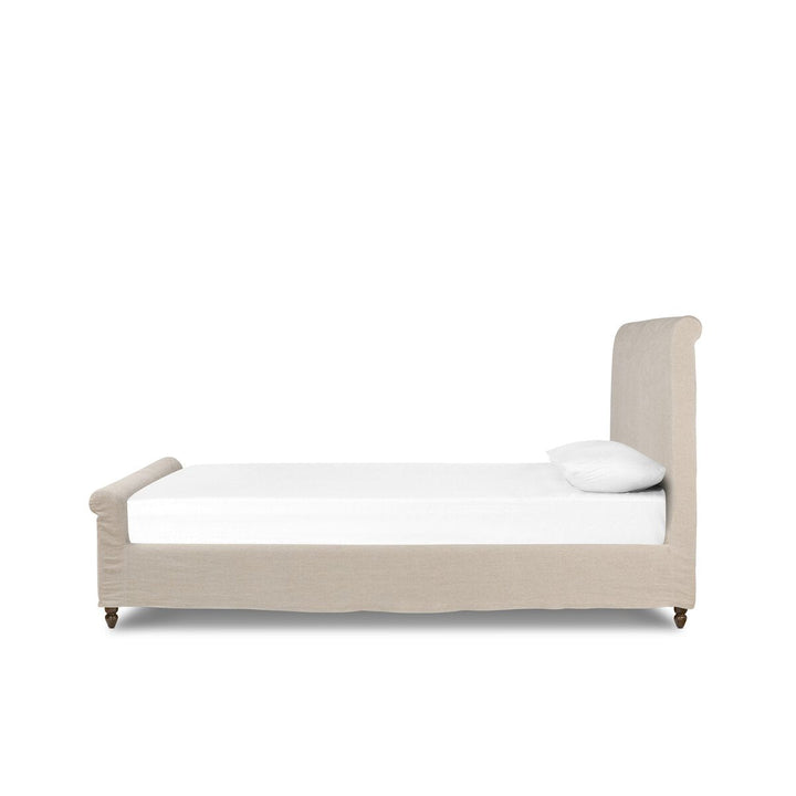 Beige bed with white mattress and pillow on a white background