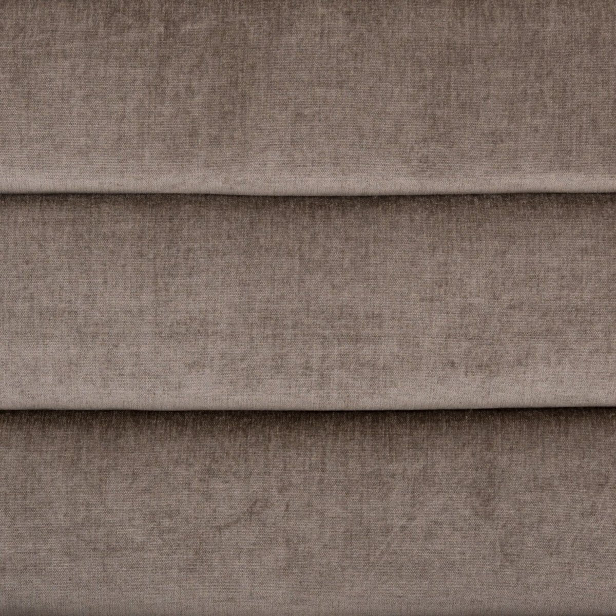 Close-up of brown fabric with a textured pattern