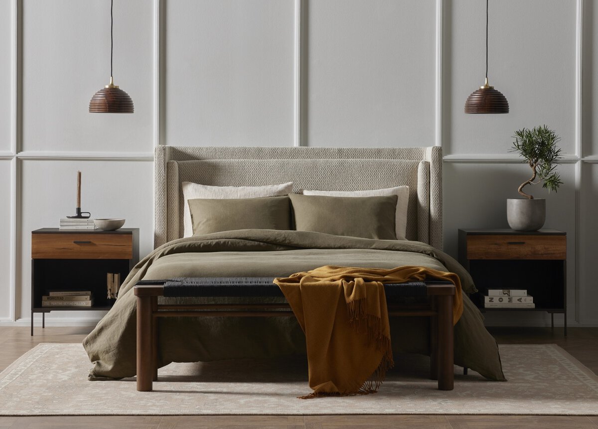 Modern Dobson Bed featuring textured upholstery and cradle base