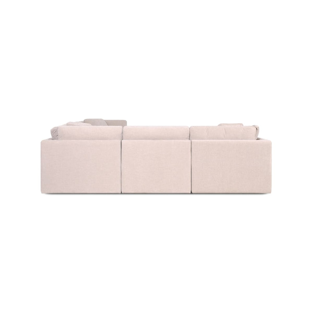 Beige sectional sofa on a white background