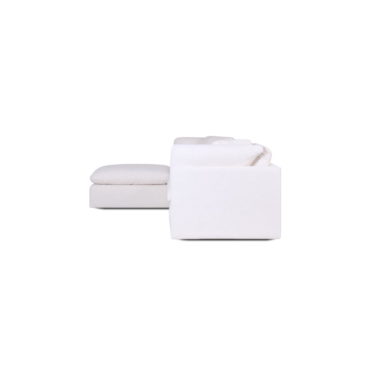 White ottoman and cushion set on a white background