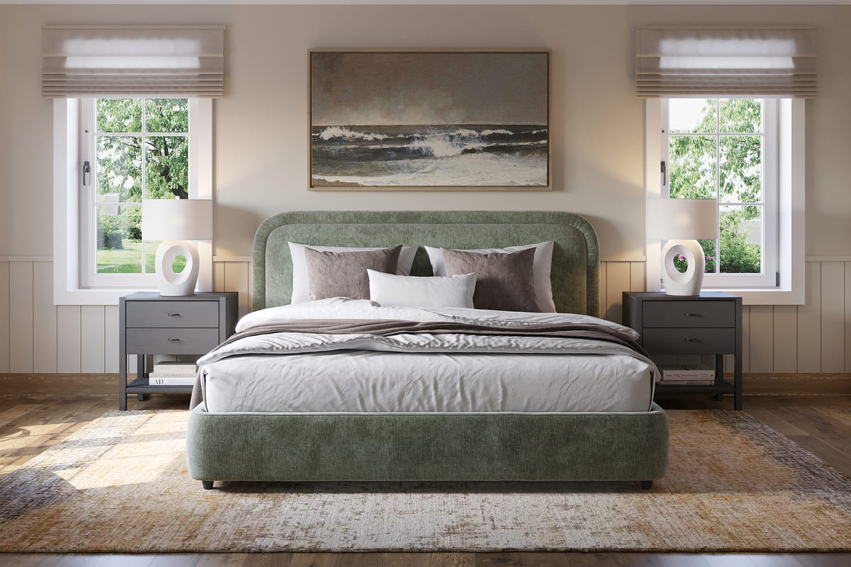 Green bed in a bedroom with two windows, lamps, and a painting on the wall.