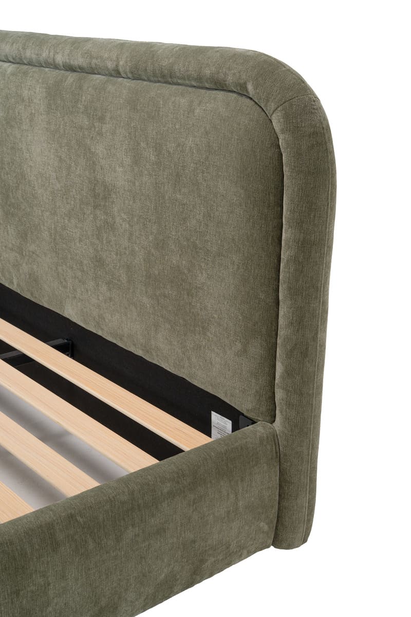 Green upholstered bed frame with wooden slats on a white background