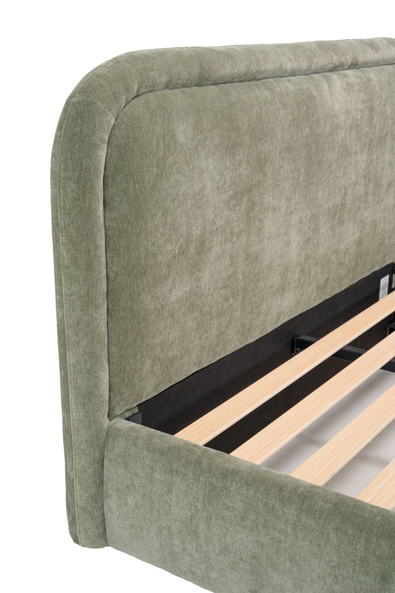 Green upholstered bed frame with wooden slats on a white background