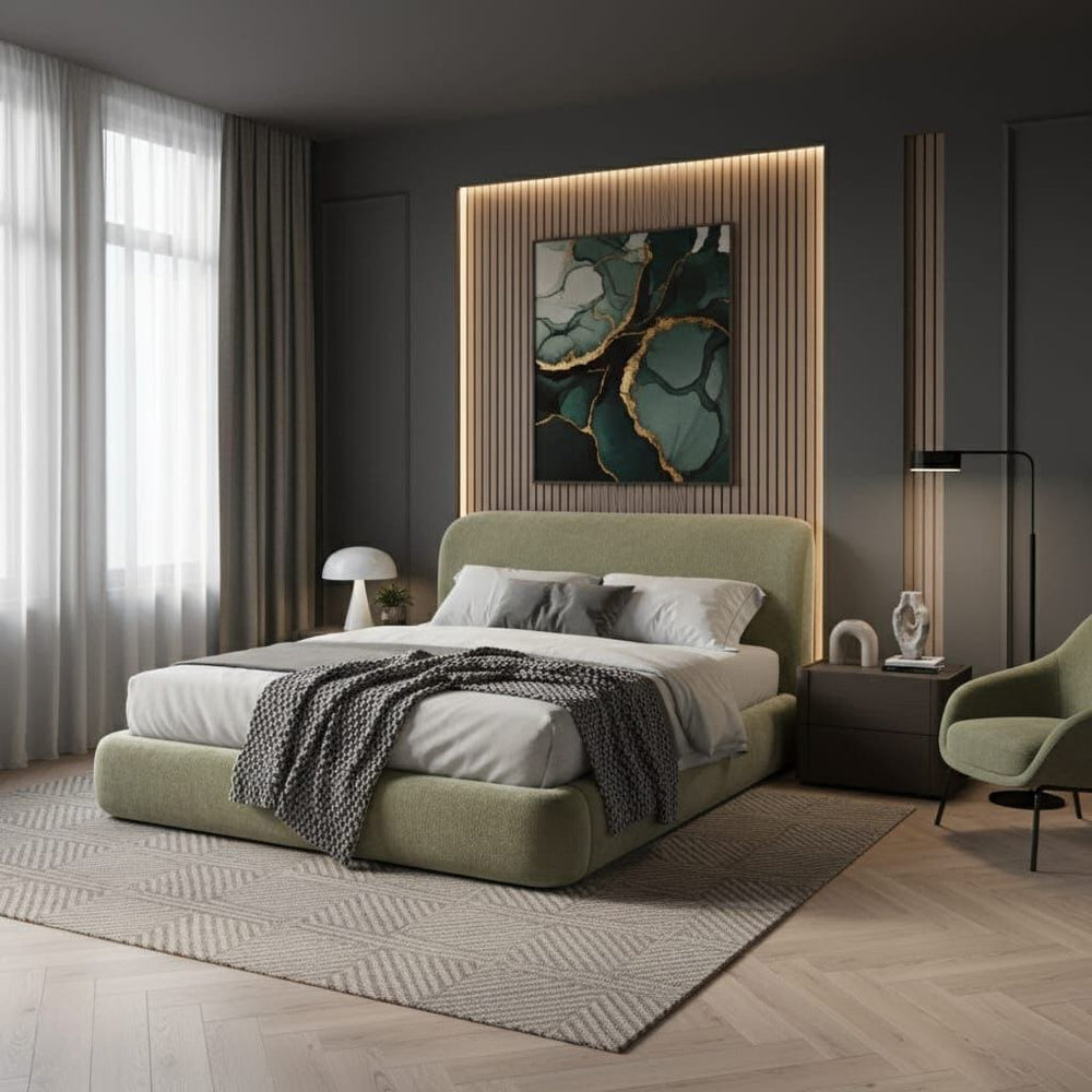 Modern bedroom with green bed, abstract art, and side table.