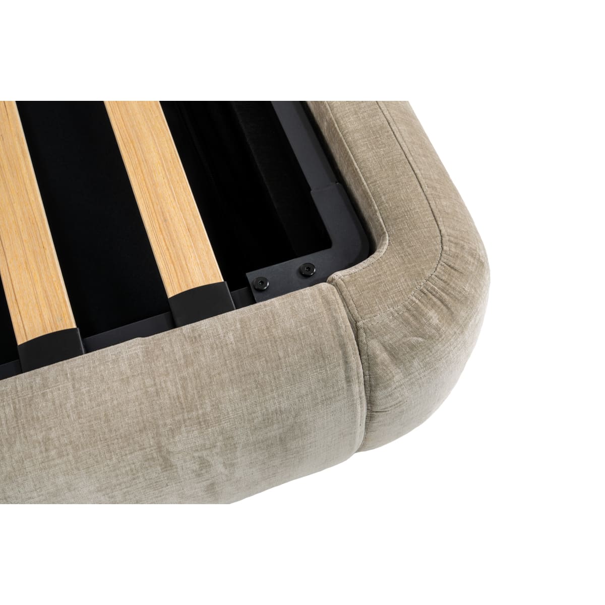 Close-up of a pet bed with wooden sides and beige fabric