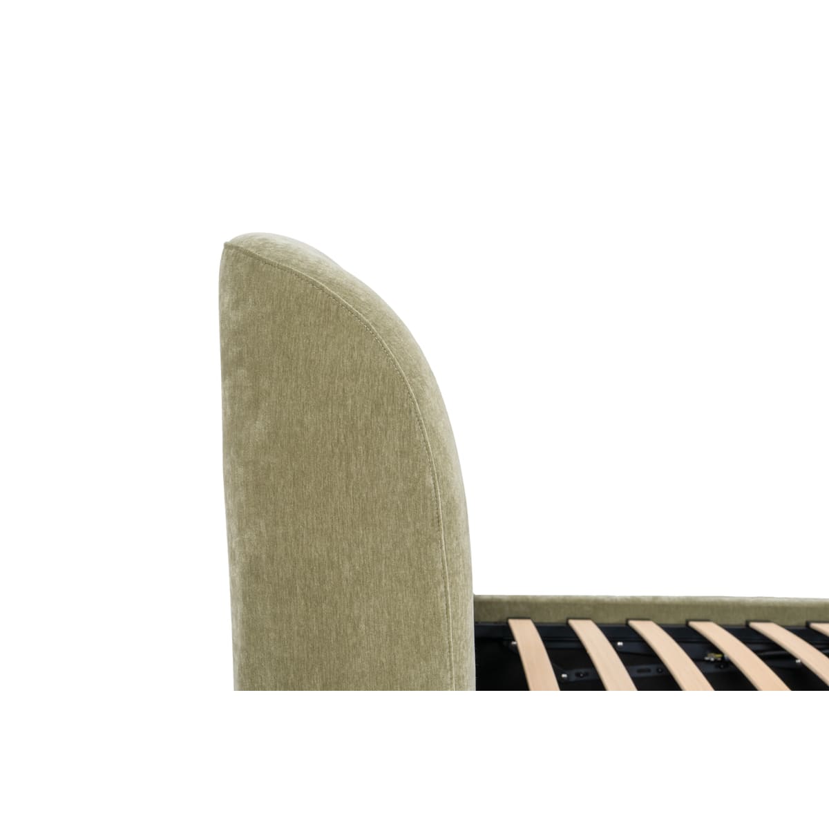 Close-up of a green upholstered headboard corner on a white background