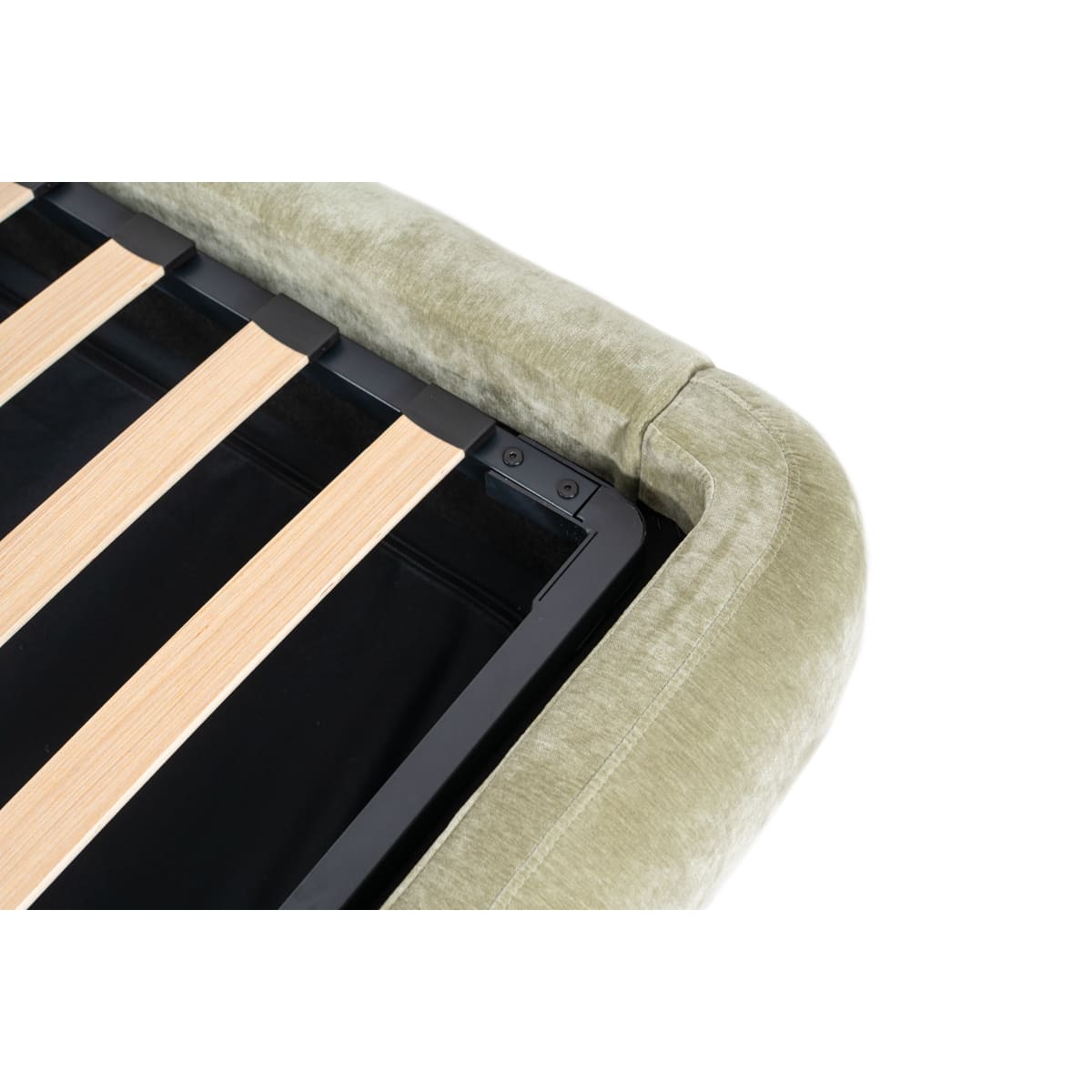 Close-up of a green upholstered chair with wooden slats on a white background