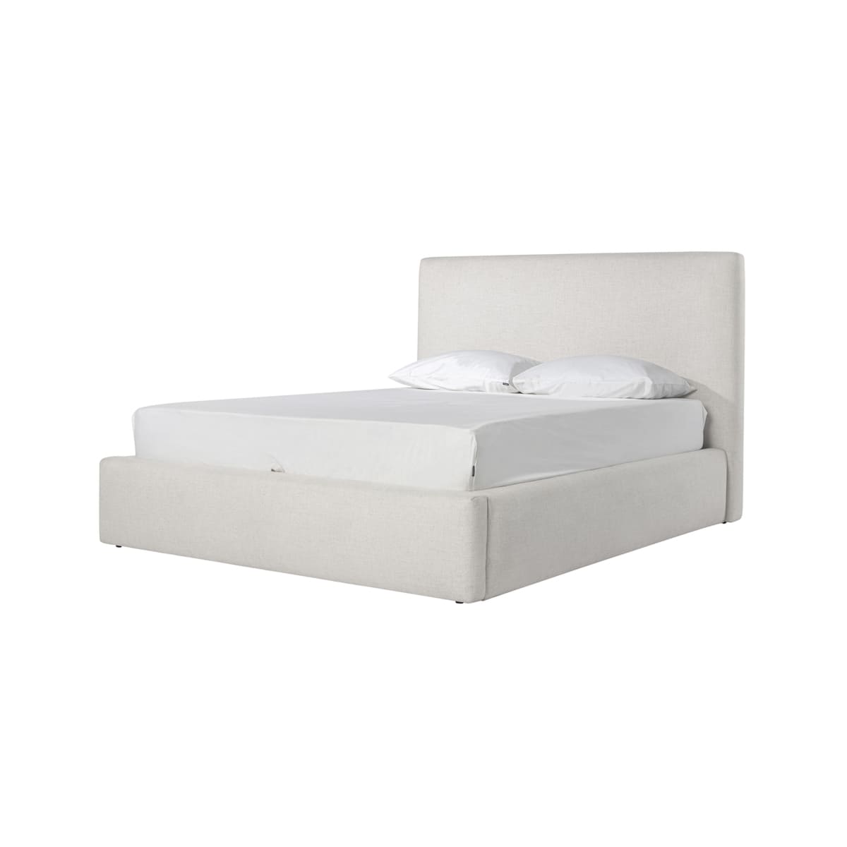 Beige upholstered bed with white bedding on a white background