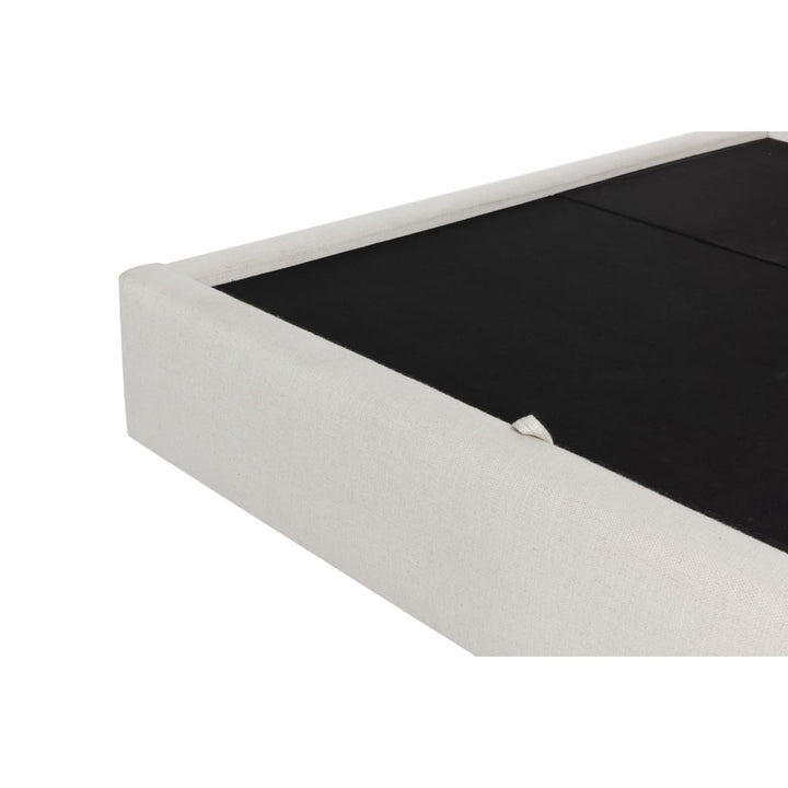 White jewelry box with a black interior on a white background