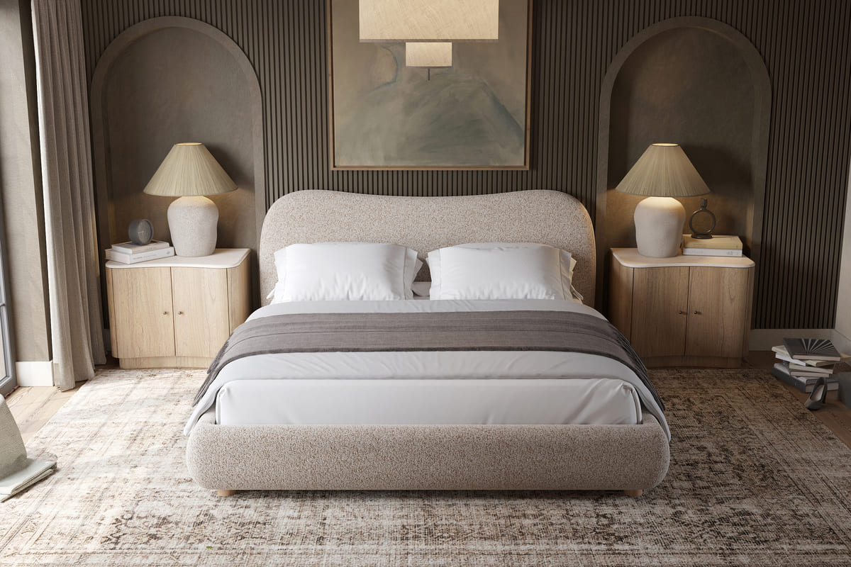 Modern bedroom with a bed, nightstands, and lamps.