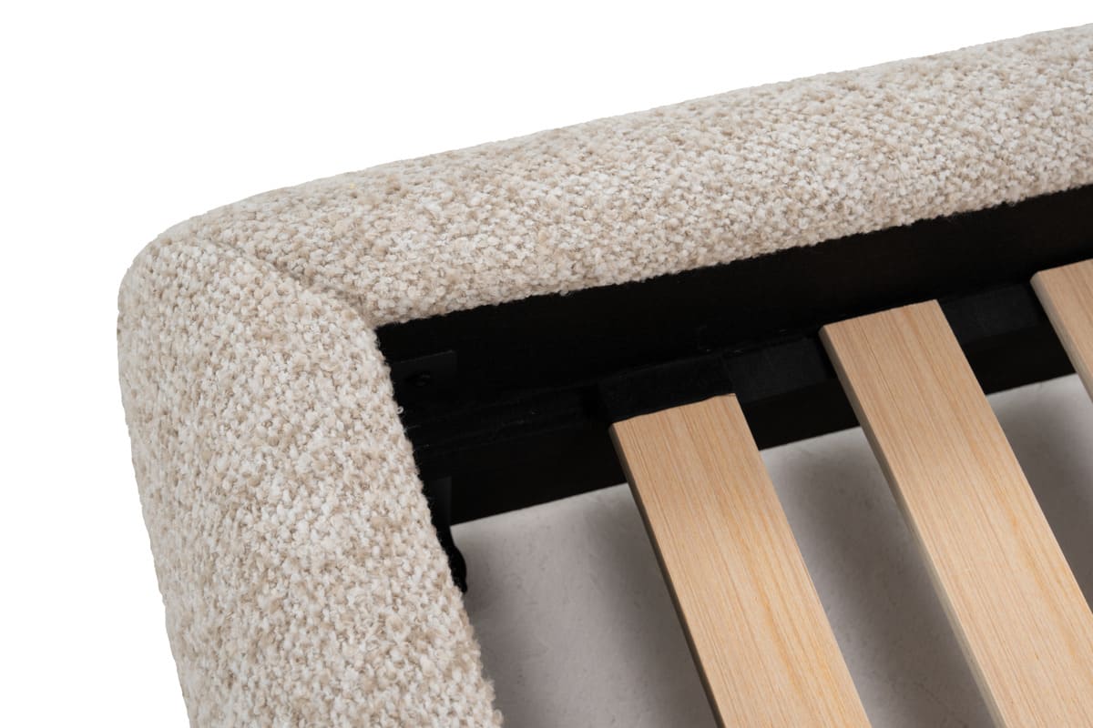 Close-up of a textured corner with wooden slats on a white background
