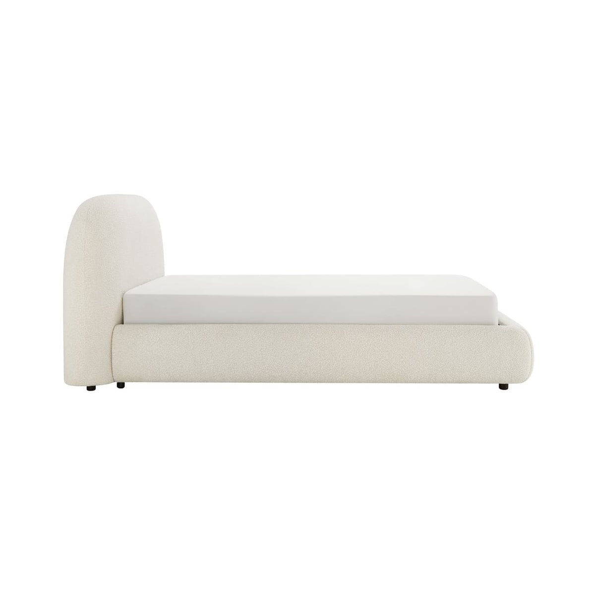 Modern white bed with a white mattress on a white background