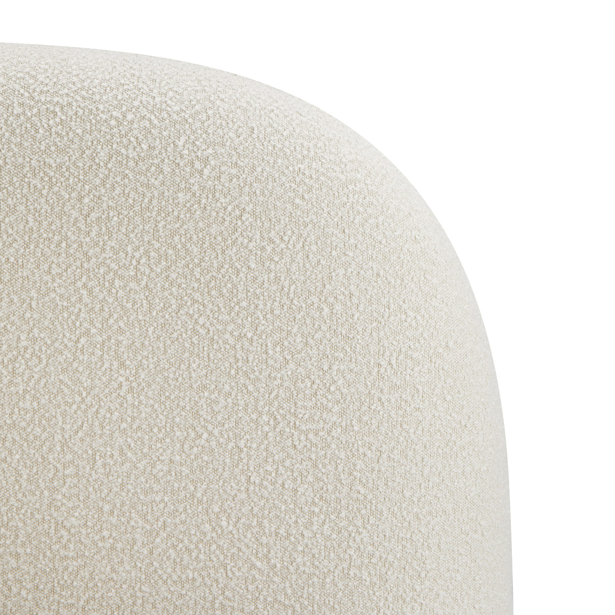 Close-up of a textured beige cushion on a white background